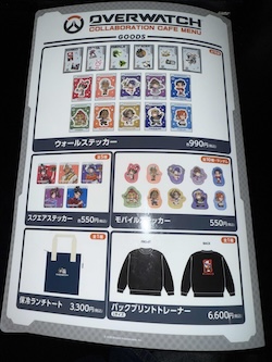 OVER WATCHとDiCE・AIMのコラボカフェを現地取材。店舗ごとの役割、フード・ドリンク、コースター前後半切替、広告情報まで整理。Field report of the OVER WATCH × DiCE collaboration cafe in Ikebukuro. Full guide to food, stores, bonus coasters and campaign details.